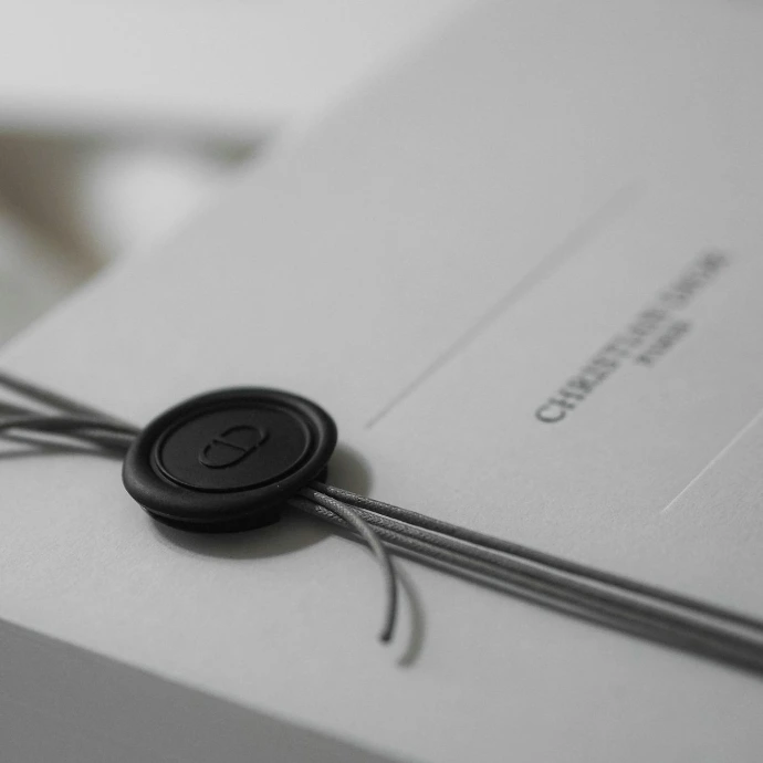 White box with christian dior paris logo and seal